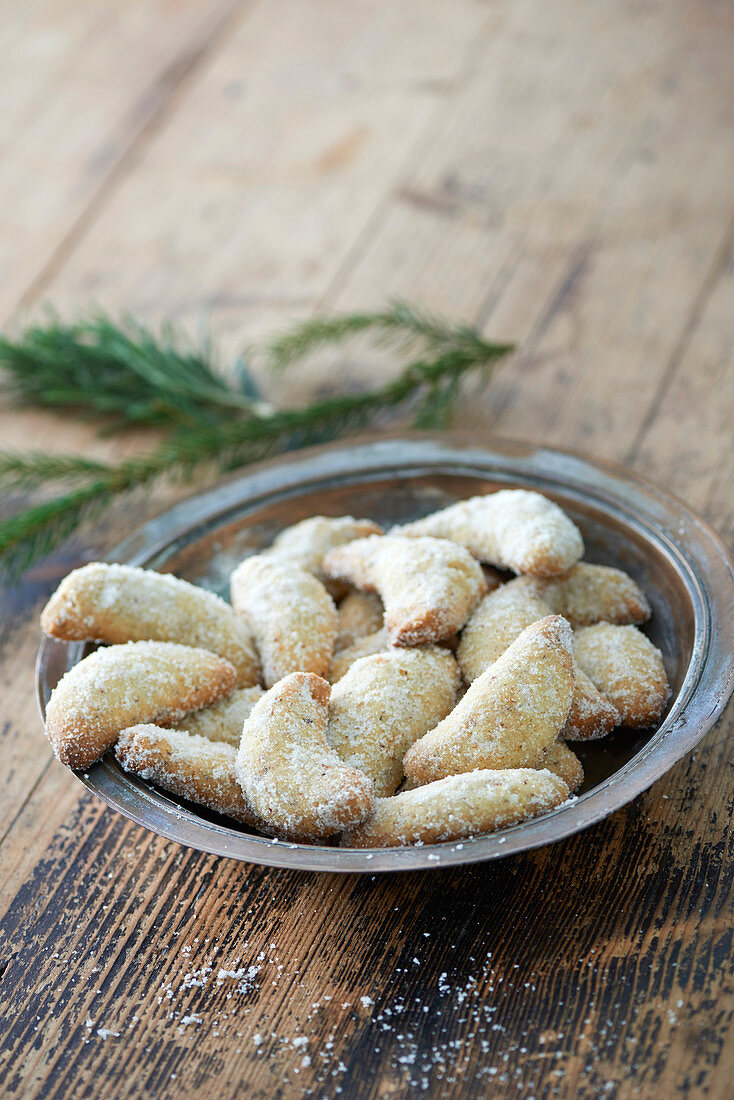 Vanilla crescent biscuits in a metal bowl