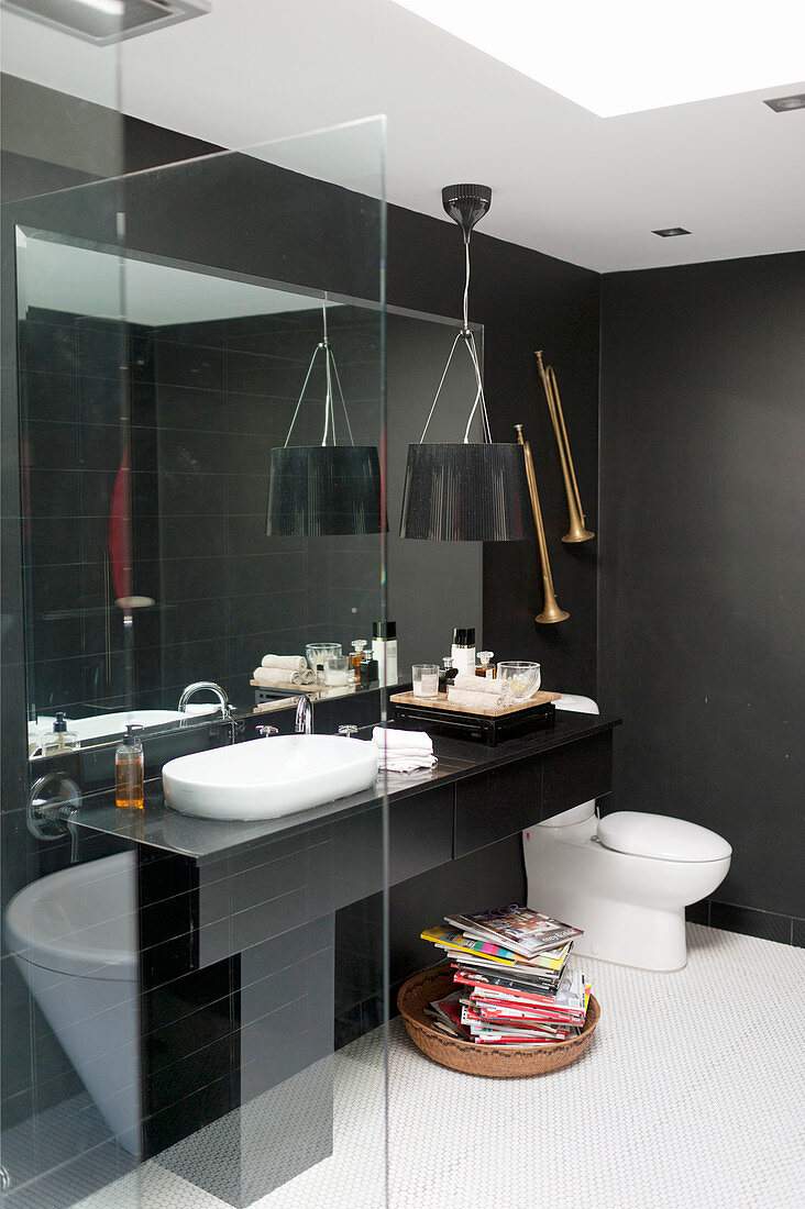 Washstand and toilet in black-and-white bathroom