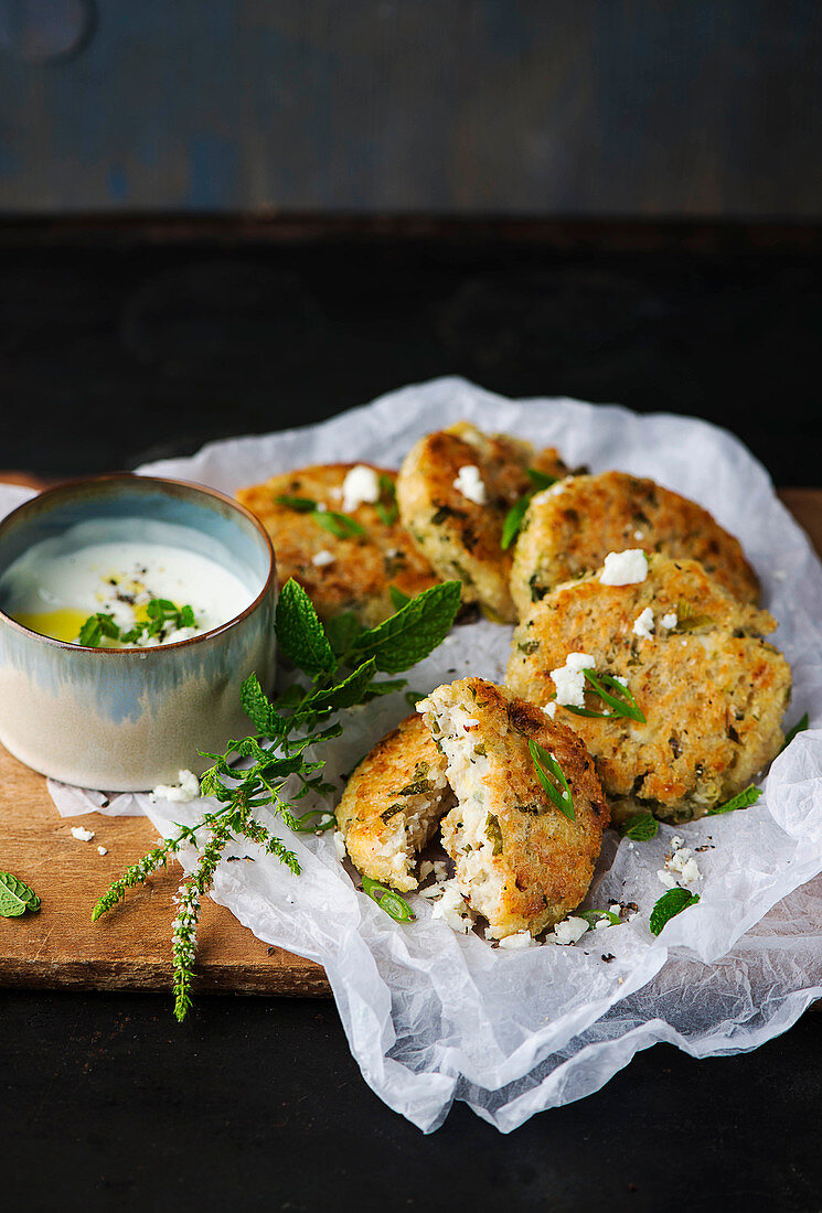 Vegetarian cauliflower cakes with mint yoghurt