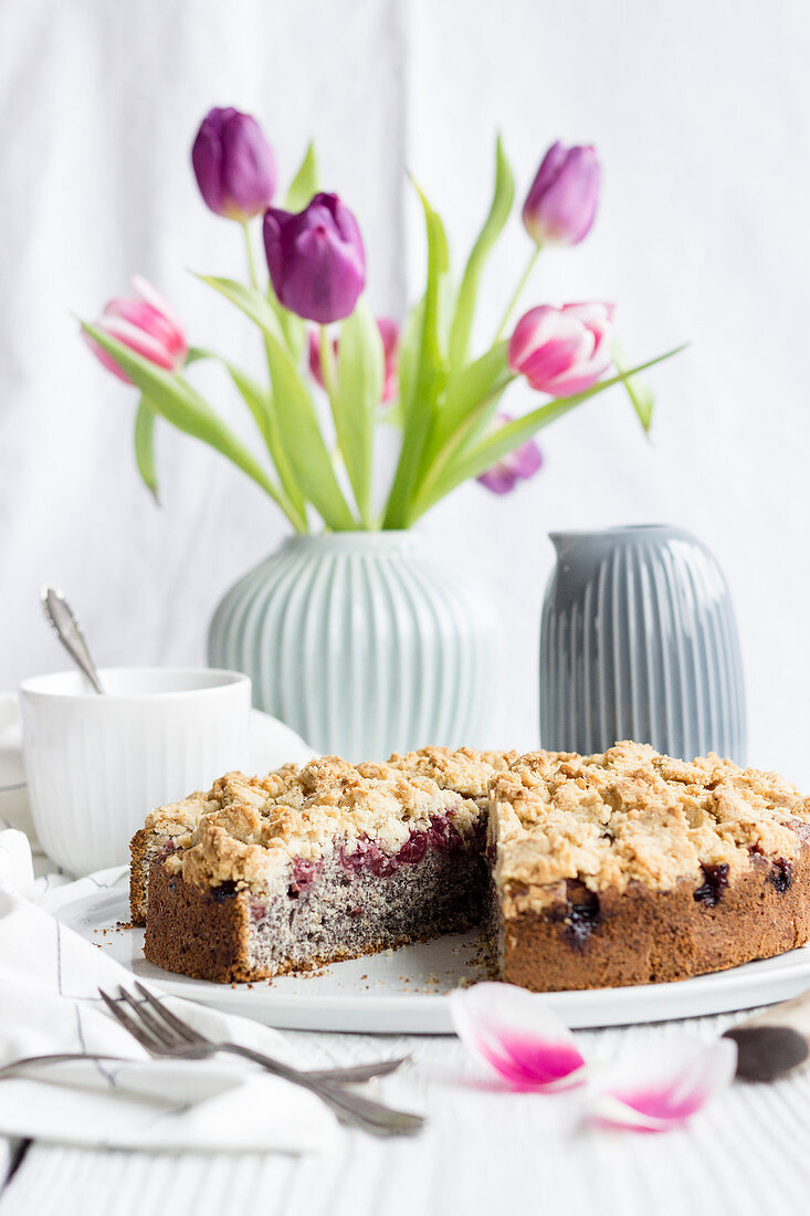 Poppyseed and cherry crumble cake