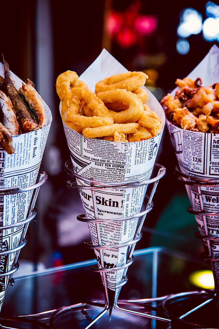 Fried squid rings in a paper bag