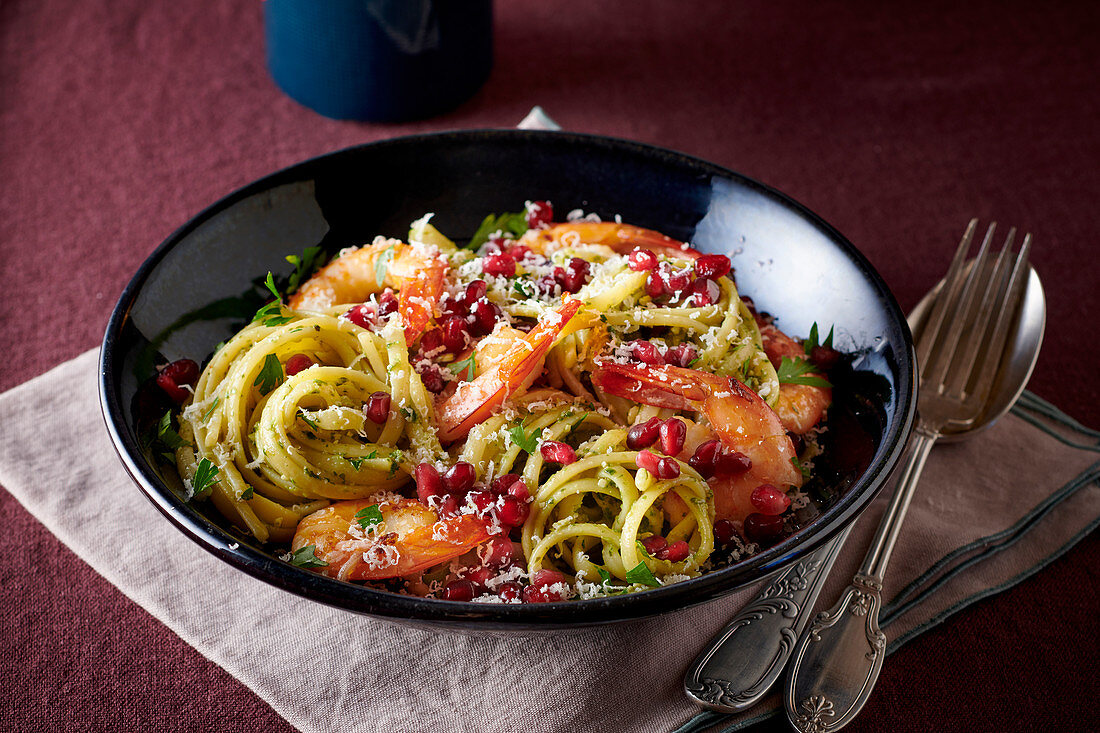 Linguine with prawns and pomegranate seeds