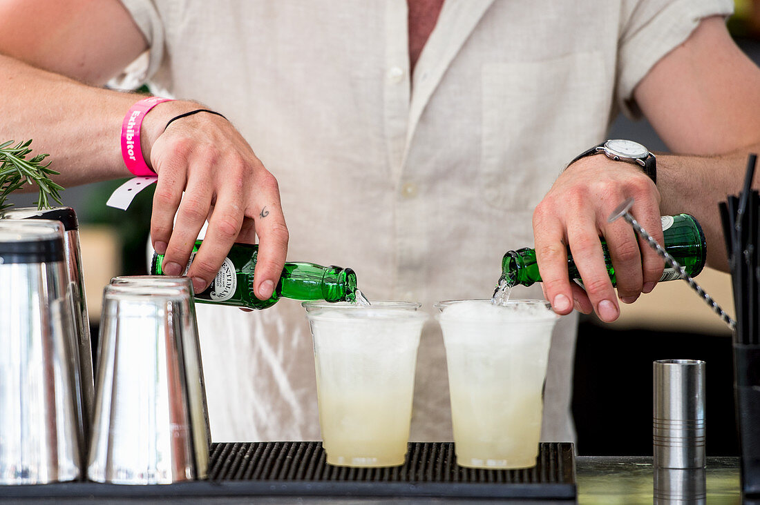 A bartender preparing cocktails