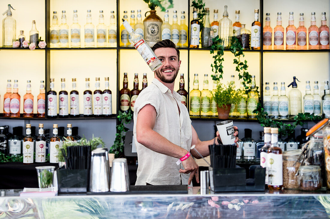 A young bartender at work