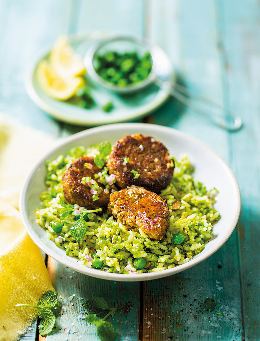Fishcakes with pea-fried rice