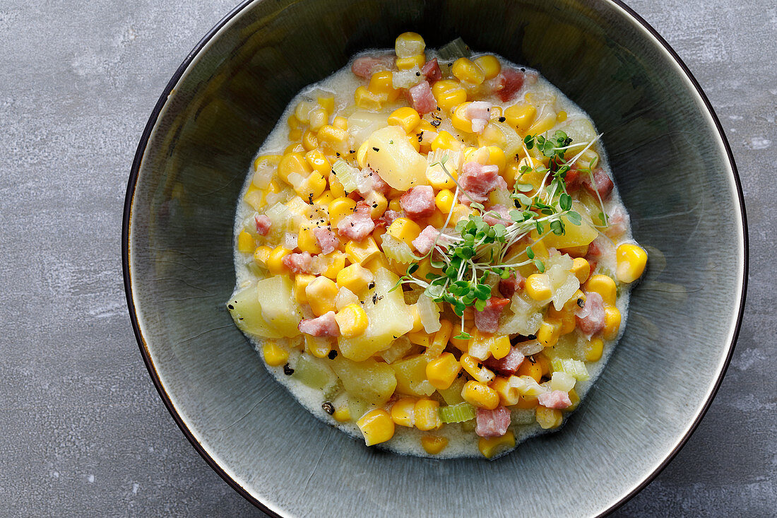 Corn chowder with bacon and cress