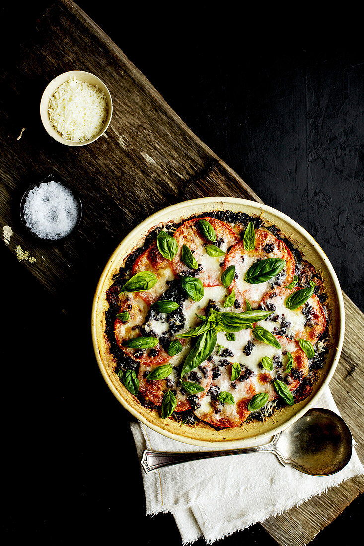 Caprese and Black Rice Casserole served in a ceramic bowl