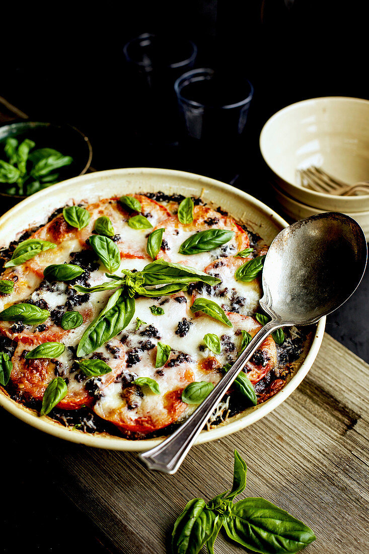 Caprese and Black Rice Casserole served in a ceramic bowl