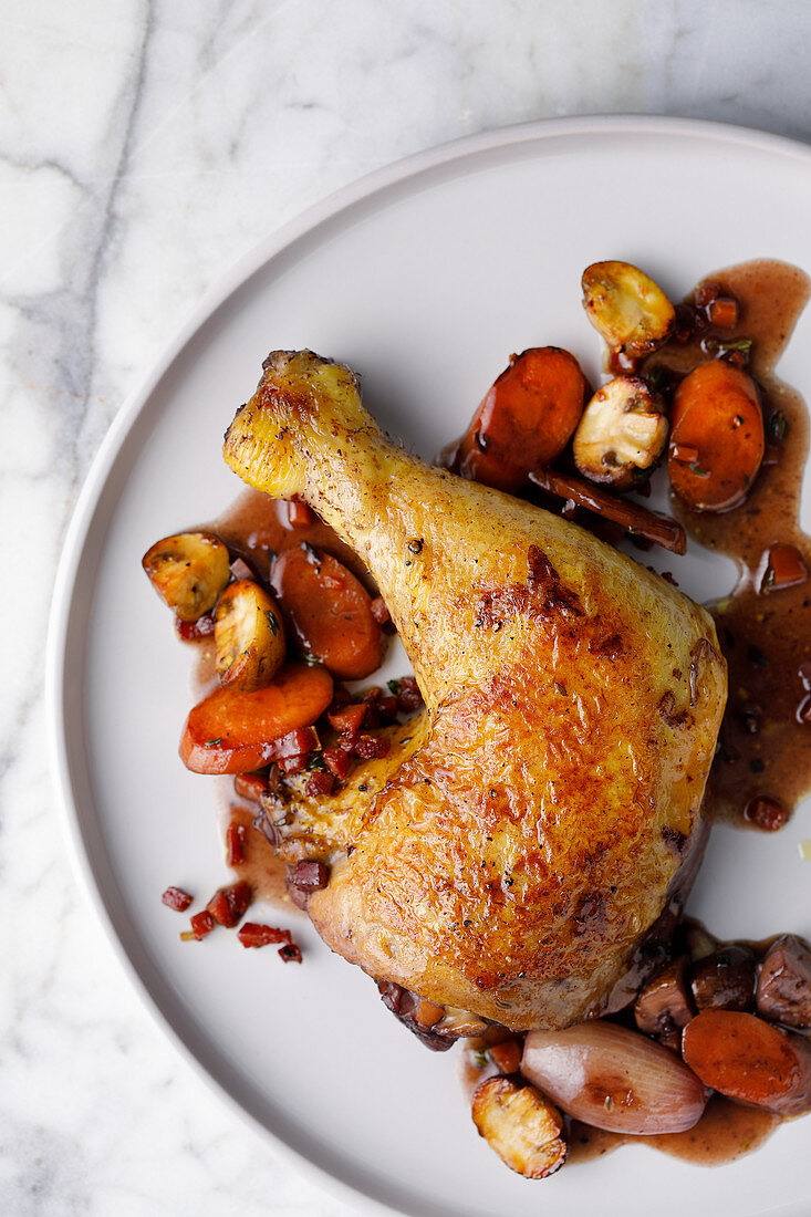 Coq au vin with carrots and mushrooms