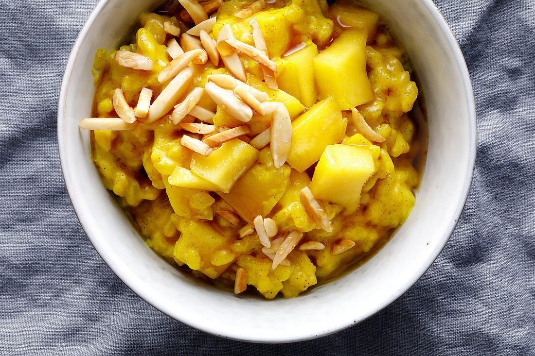 Turmeric rice pudding with mango