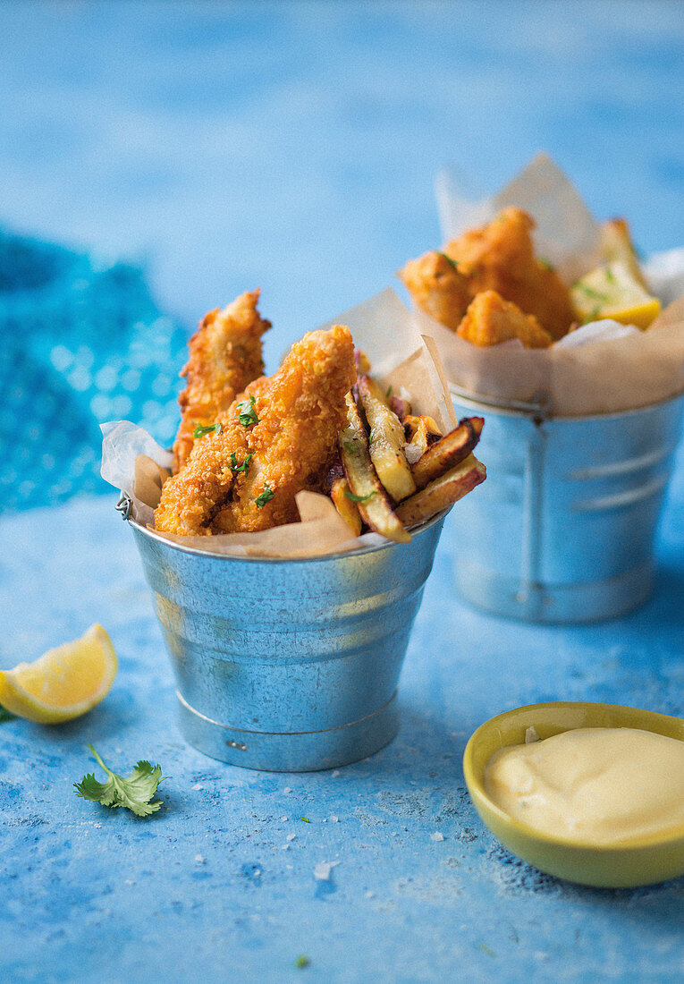 Cornflake coated fish strips and sweet potato fries