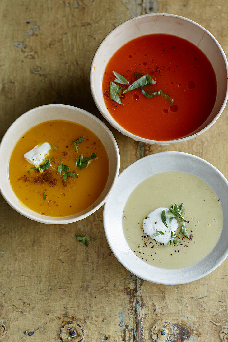 Potato soup, tomato soup and pumpkin soup