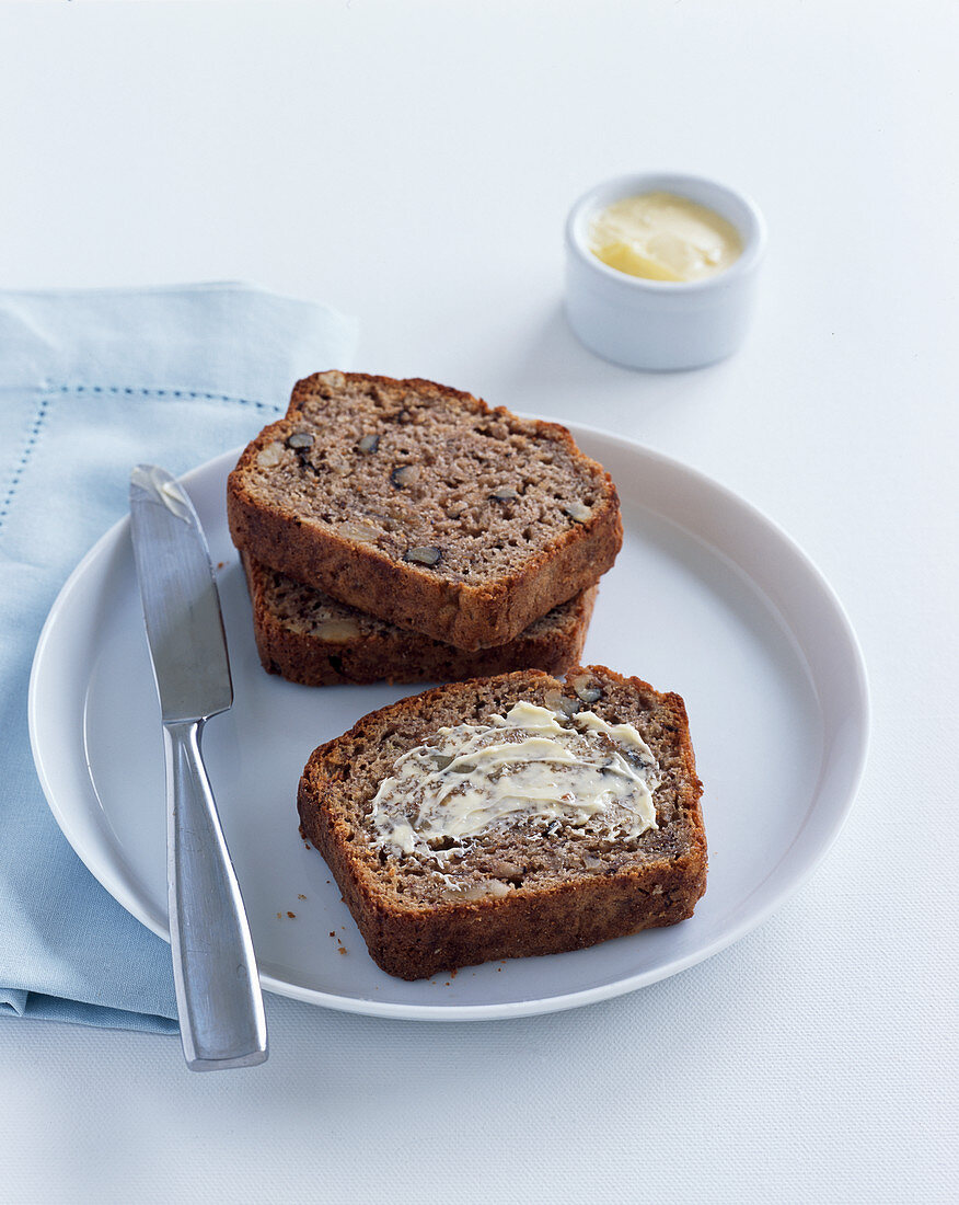 Banana and walnut bread with butter
