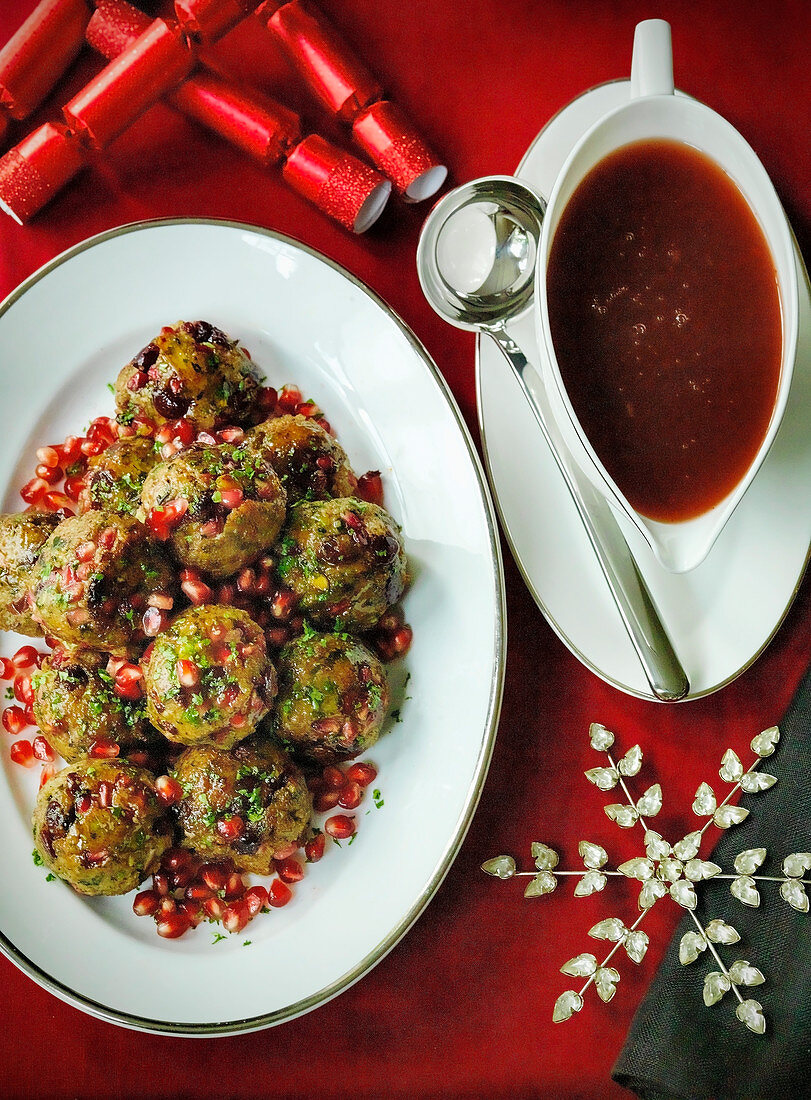 Christmas Turkey Sausage meat onion and herb stuffing with pomegranite seeds and red wine gravy