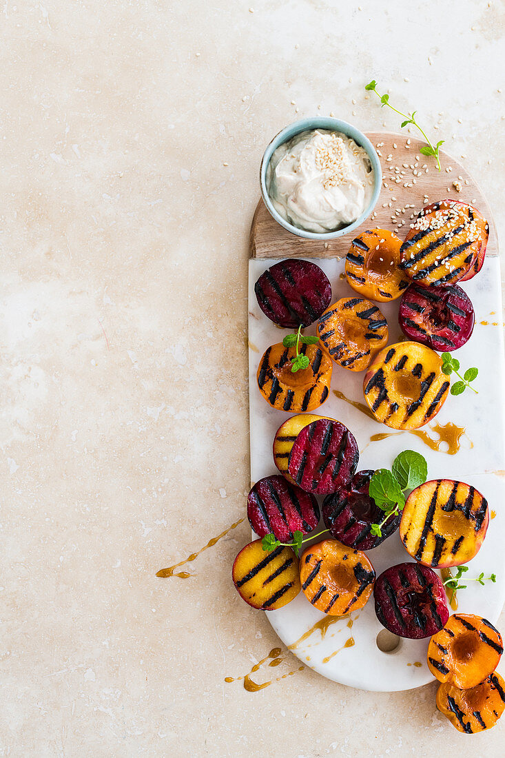 Chargrilled stone fruit with honey-and-lime syrup and tahini labneh