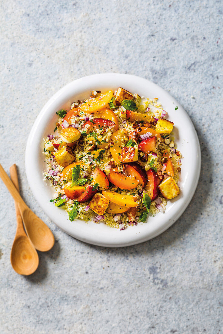 Stone fruit couscous salad with crispy halloumi