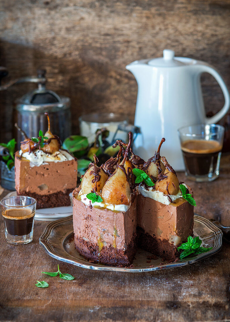 No bake chocolate cheesecake with poached pears and chocolate mousse sponge