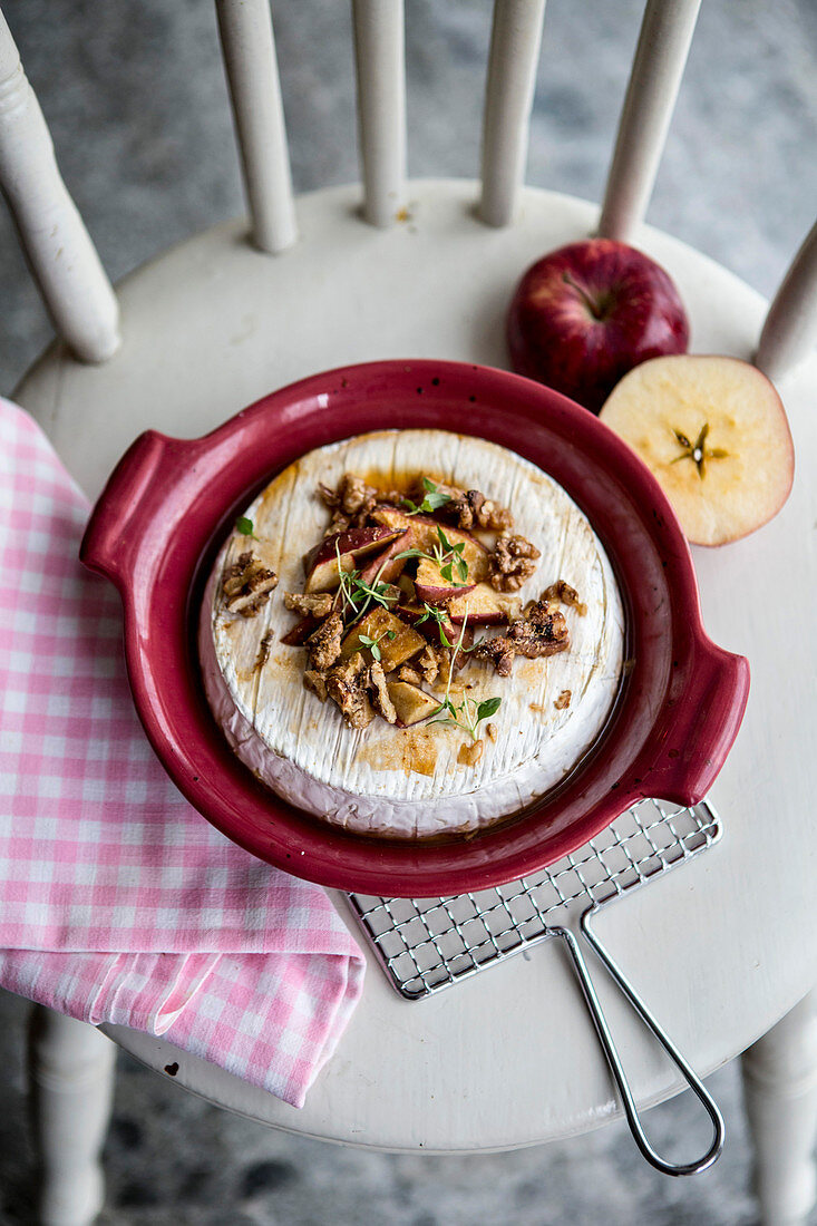 Warm brie with calvados, walnuts and apples