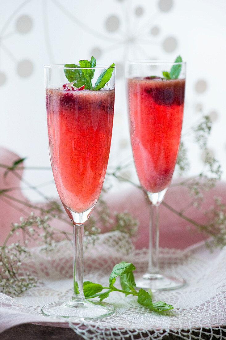 Raspberry drinks with basil