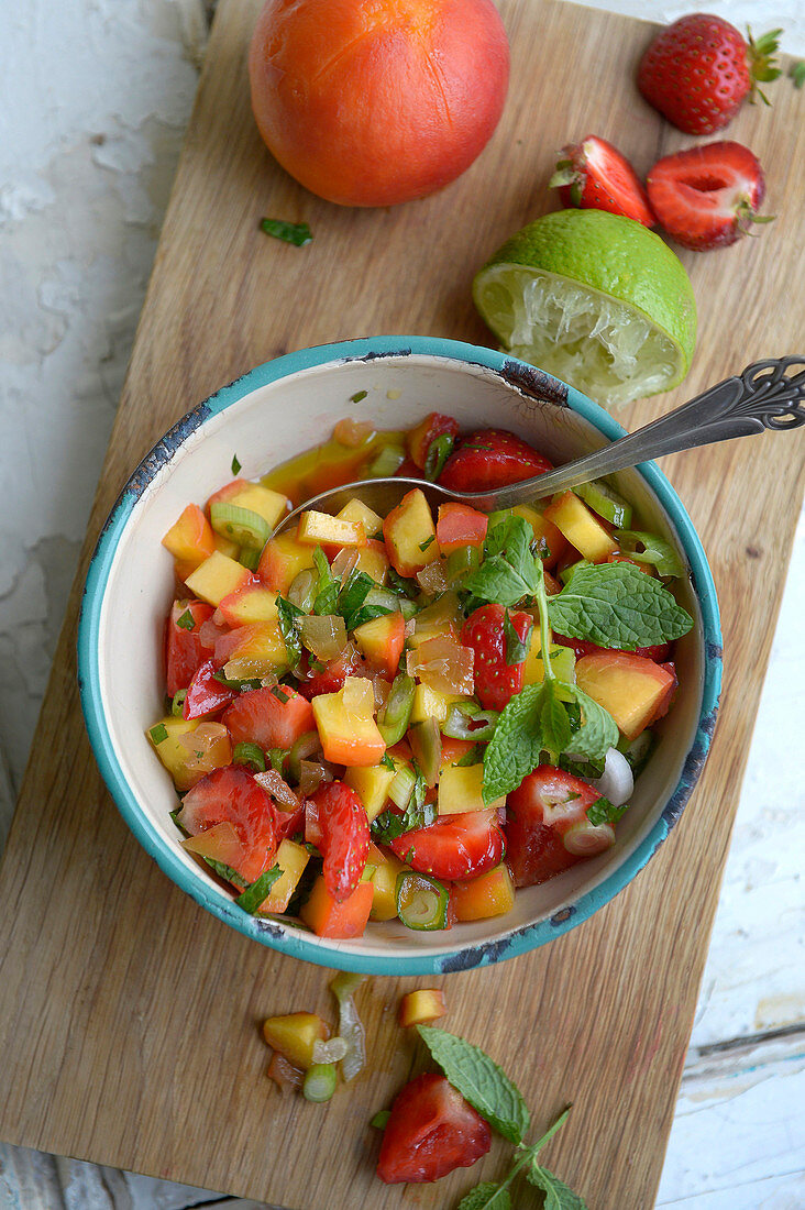 Peach salsa with strawberries and mint