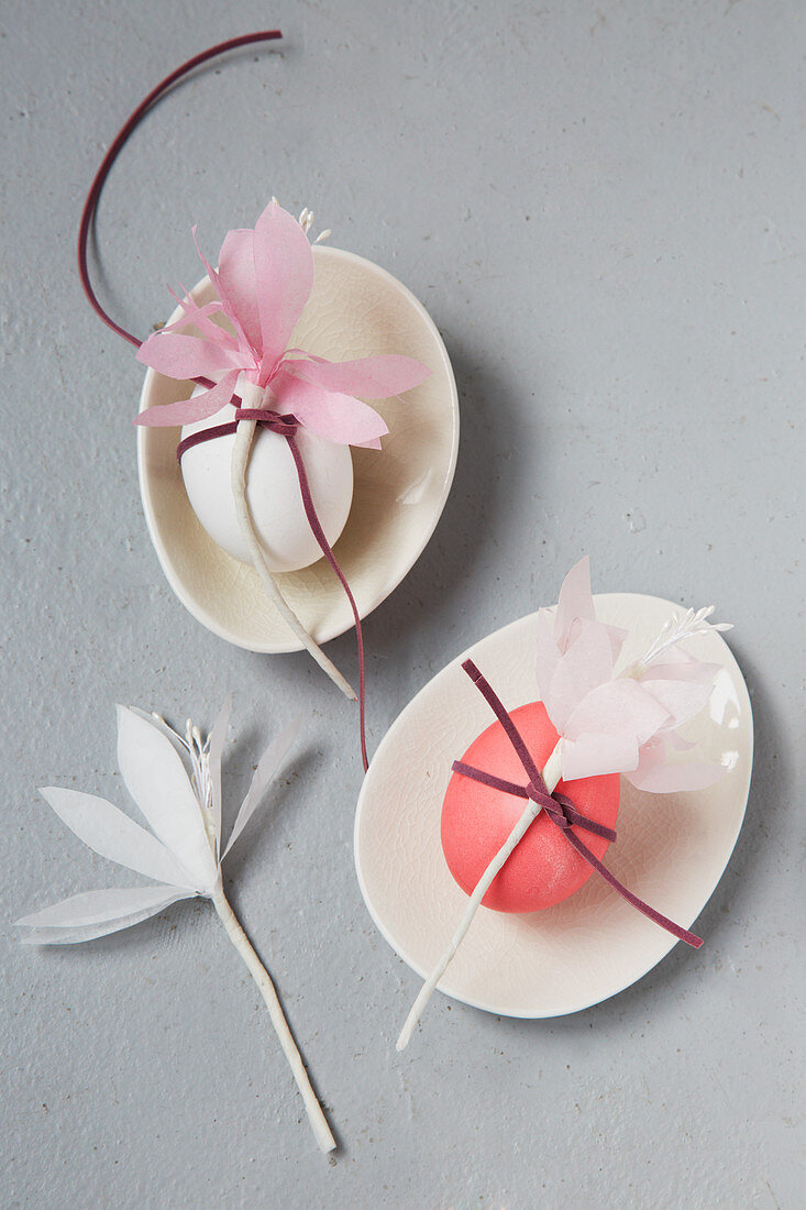 Easter eggs decorated with paper flowers