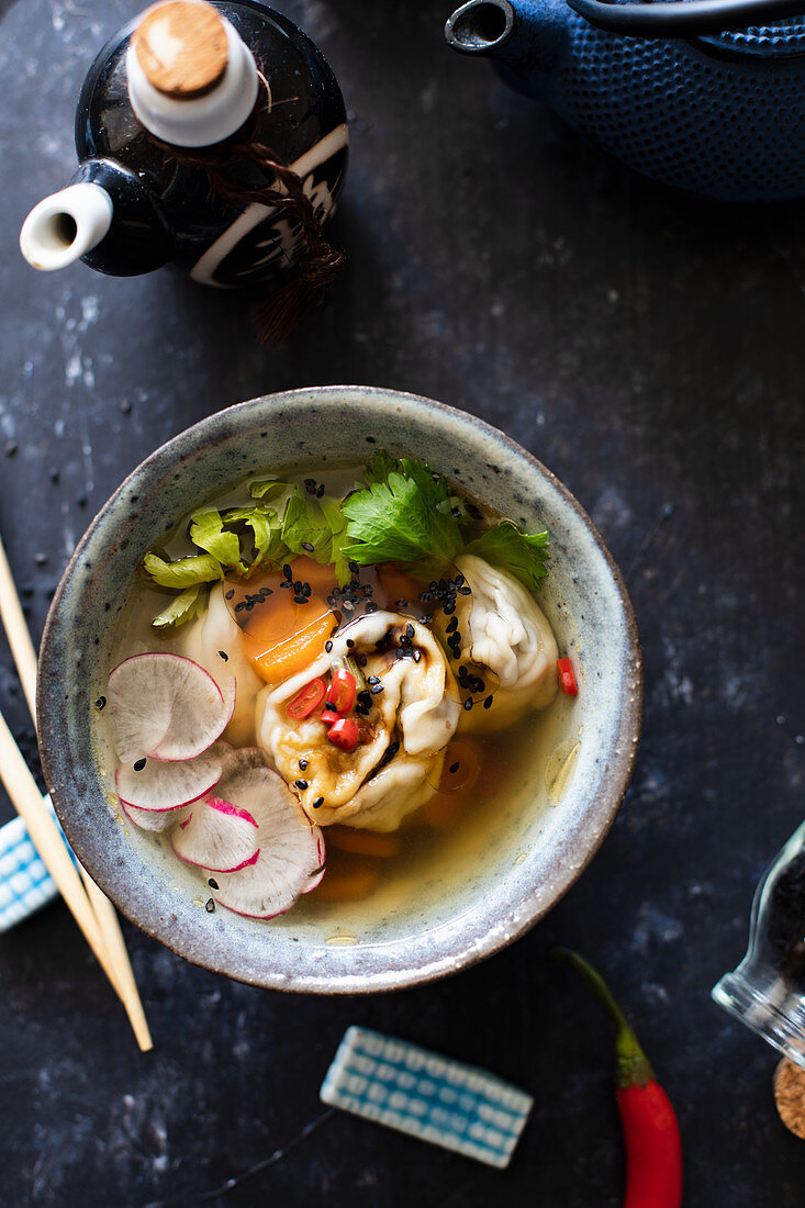 Duck dumplings in broth