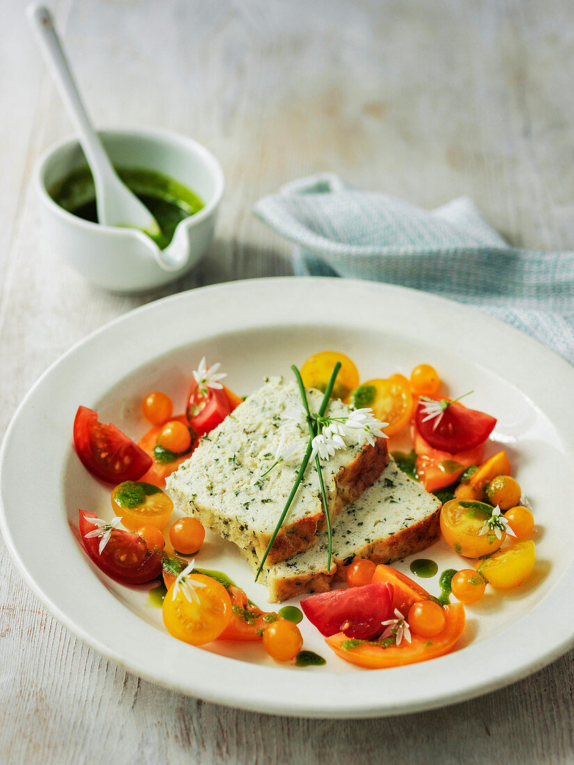 Ricotta cheese and herb loaf with tomato salad
