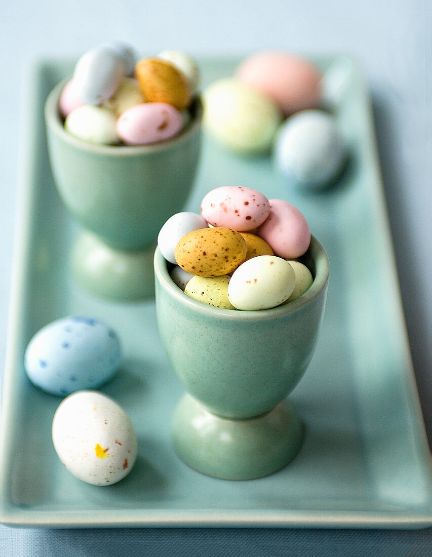 Baby easter eggs in egg cups