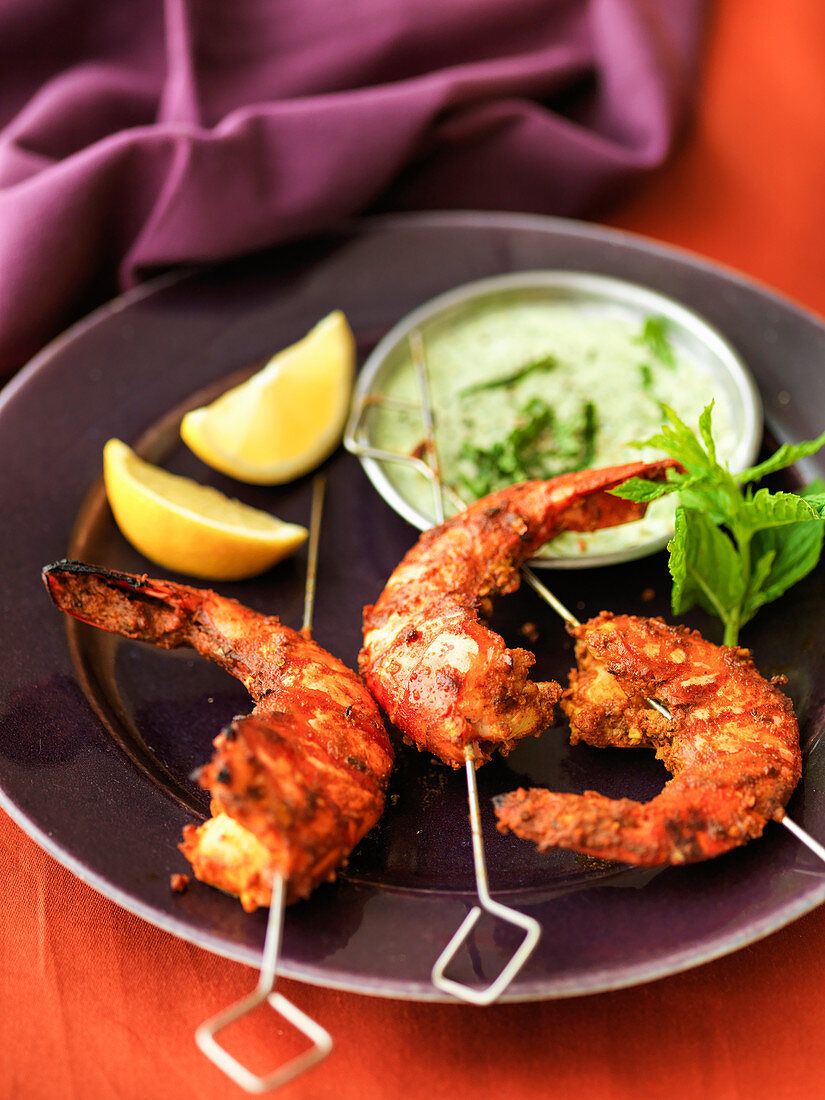 Indian tandoori prawns with cucumber raita dipping sauce