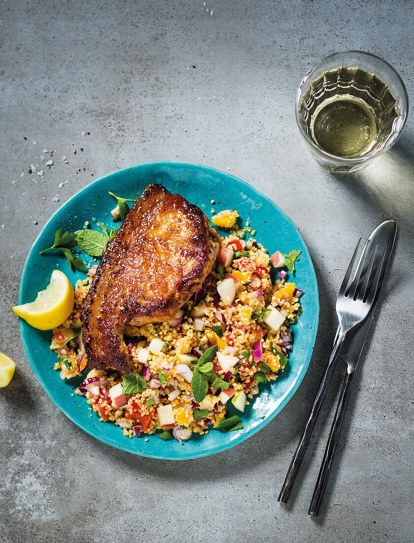 Harissa pork chops with apple couscous