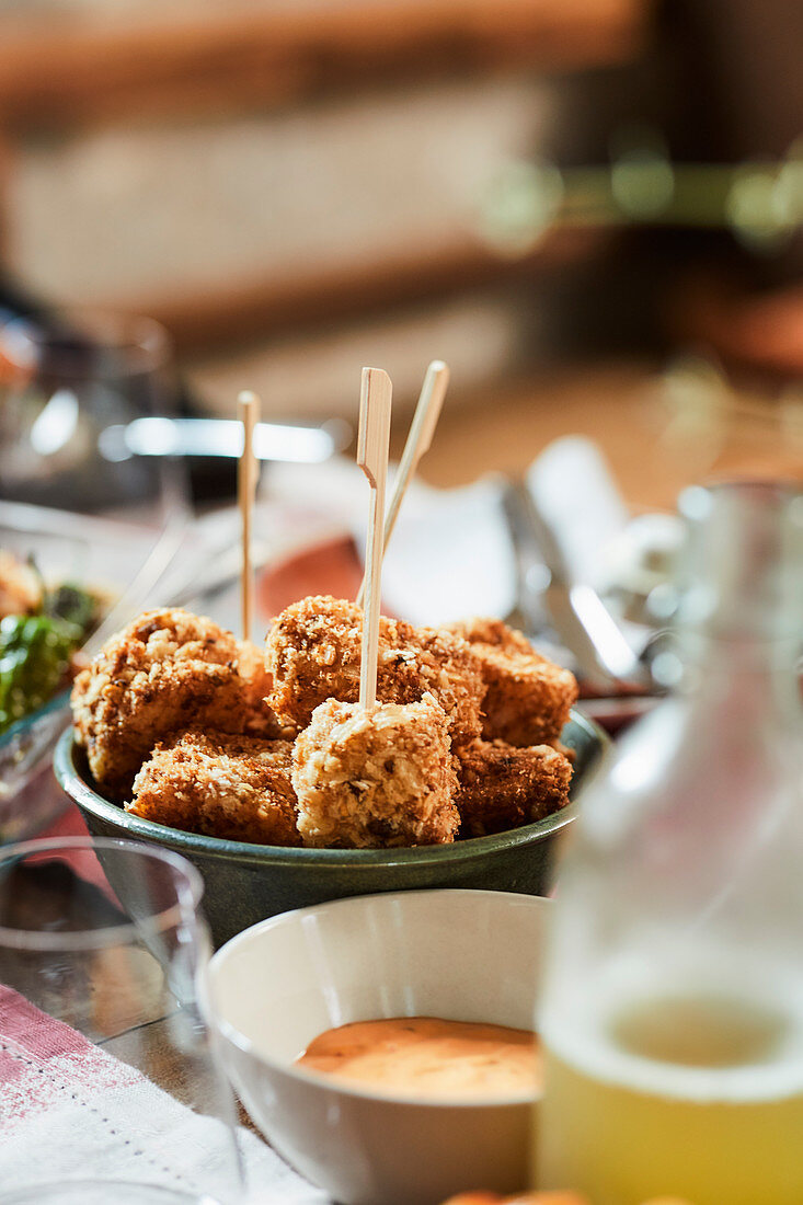 Crunchy fish pieces with coconut and wasabi breadcrumbs