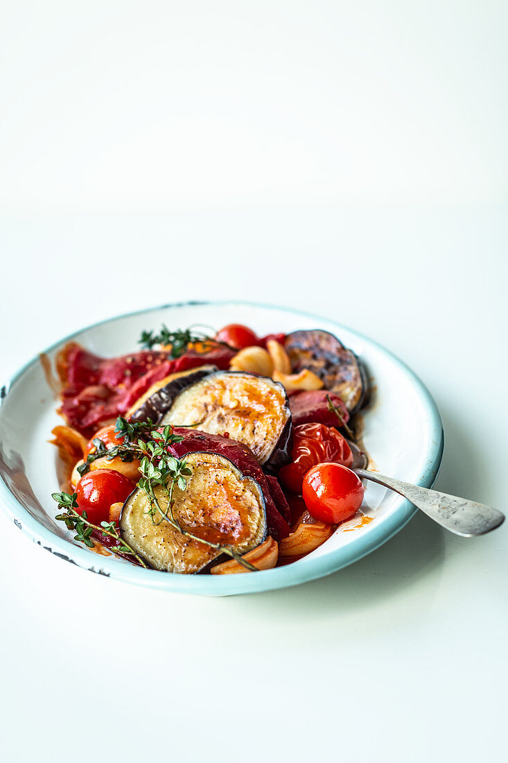 Pepper and aubergine medley with tomatoes