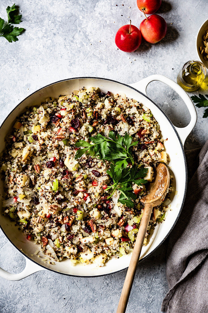 Quinoa and apple stuffing in a mixing bowl