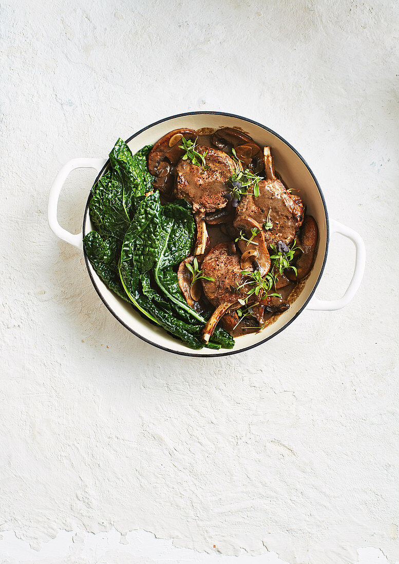 Veal with mushrooms and tuscan kale