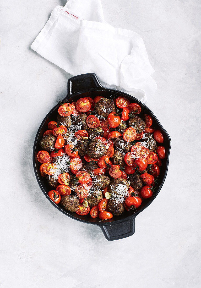 Lentil balls with roasted cherry tomato sauce