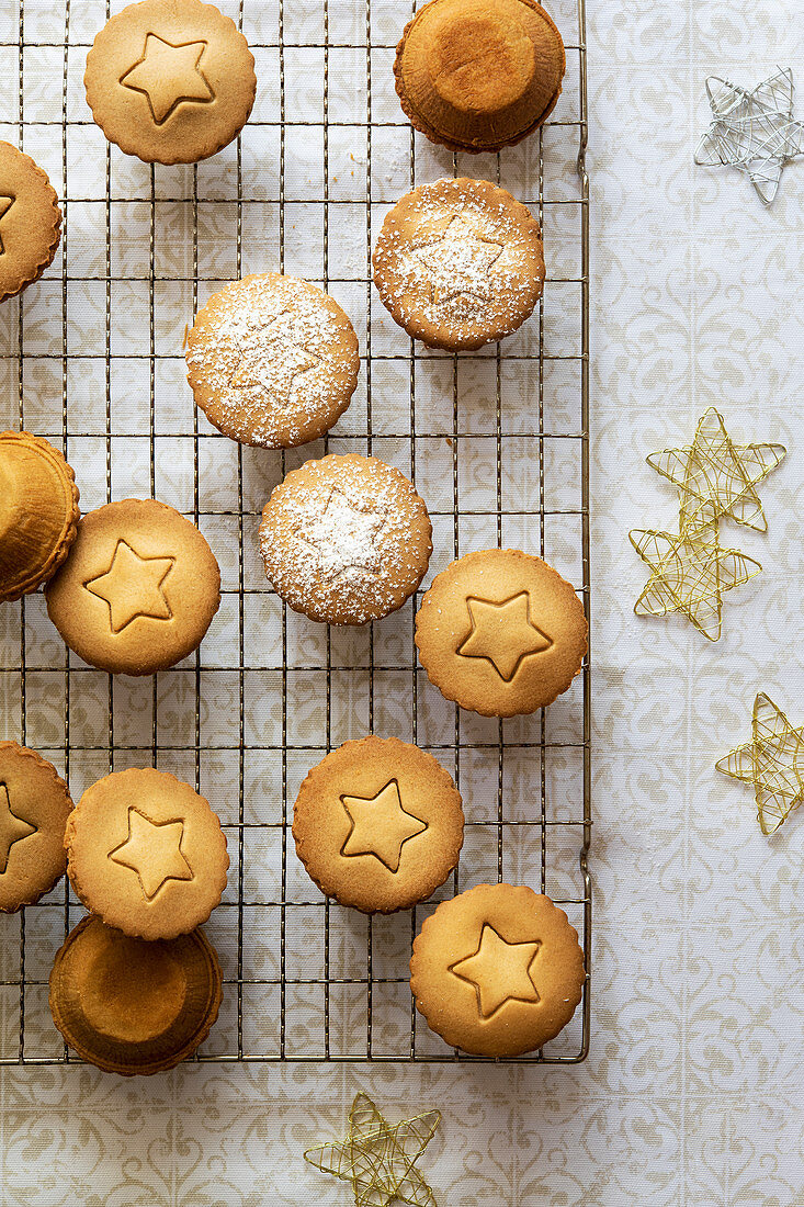 Individual fruit mince pies each with a star shape on top