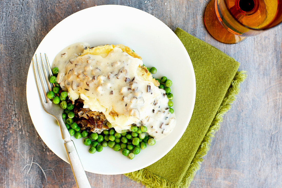 Shiitake Mushroom Wild Rice Shepard's Pie served with Peas and Gravy