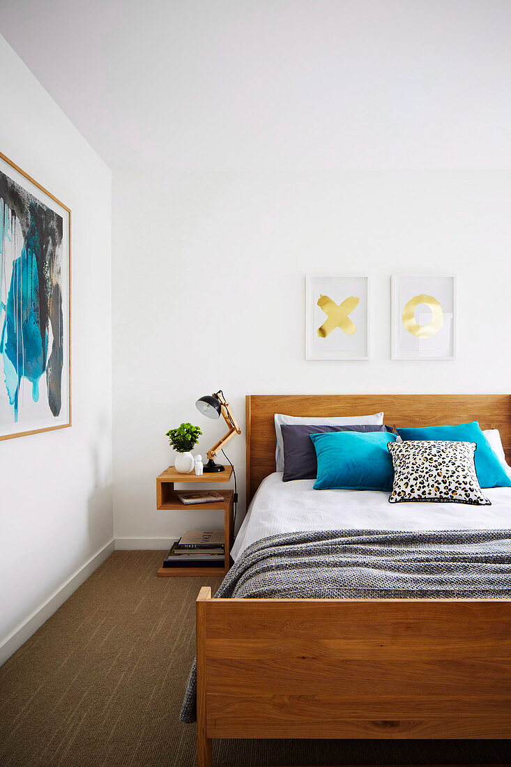 Modern bedroom with a simple wooden bed