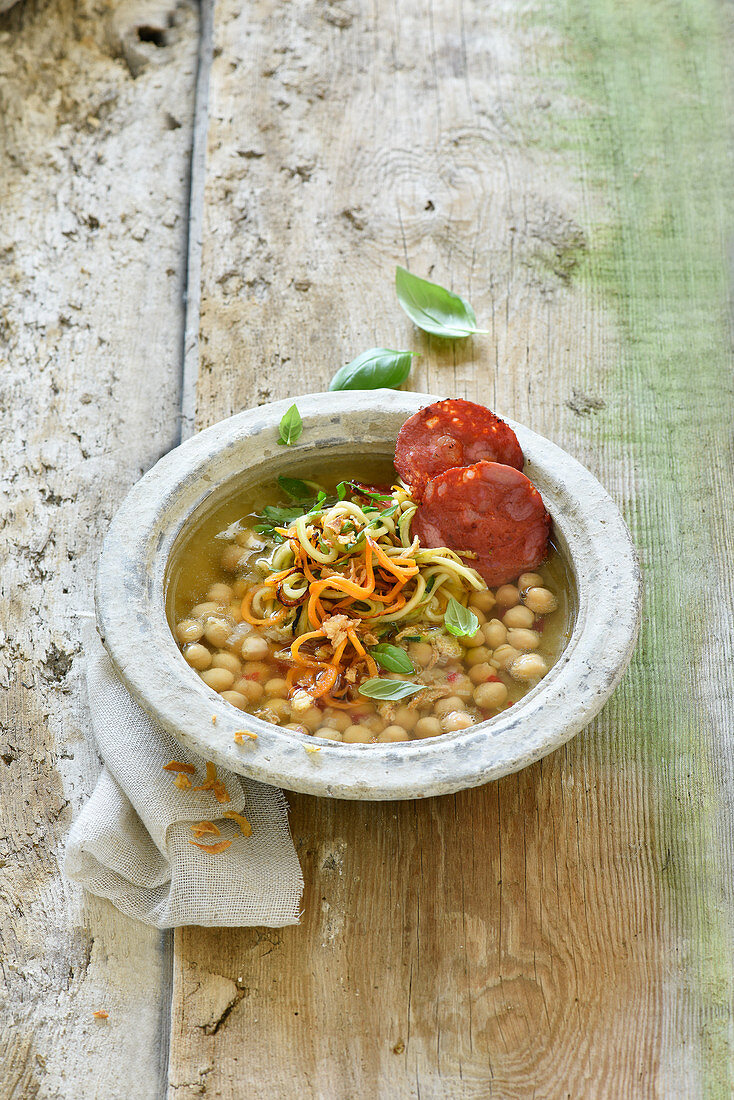 Vegetable noodle soup with chickpeas and chorizo