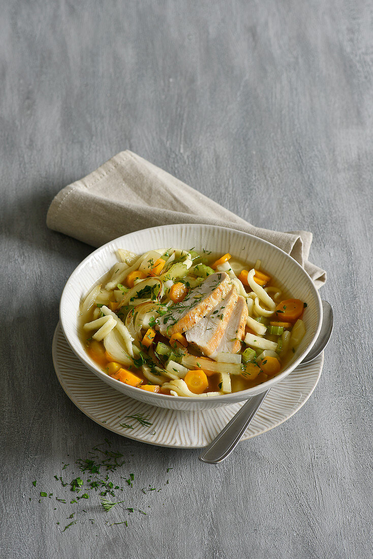 Root vegetable stew with spätzle and chicken breast fillets