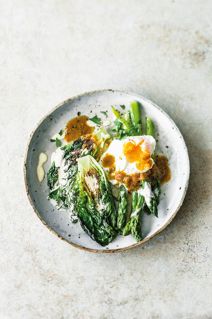 Roasted lettuce hearts, asparagus, and a poached egg