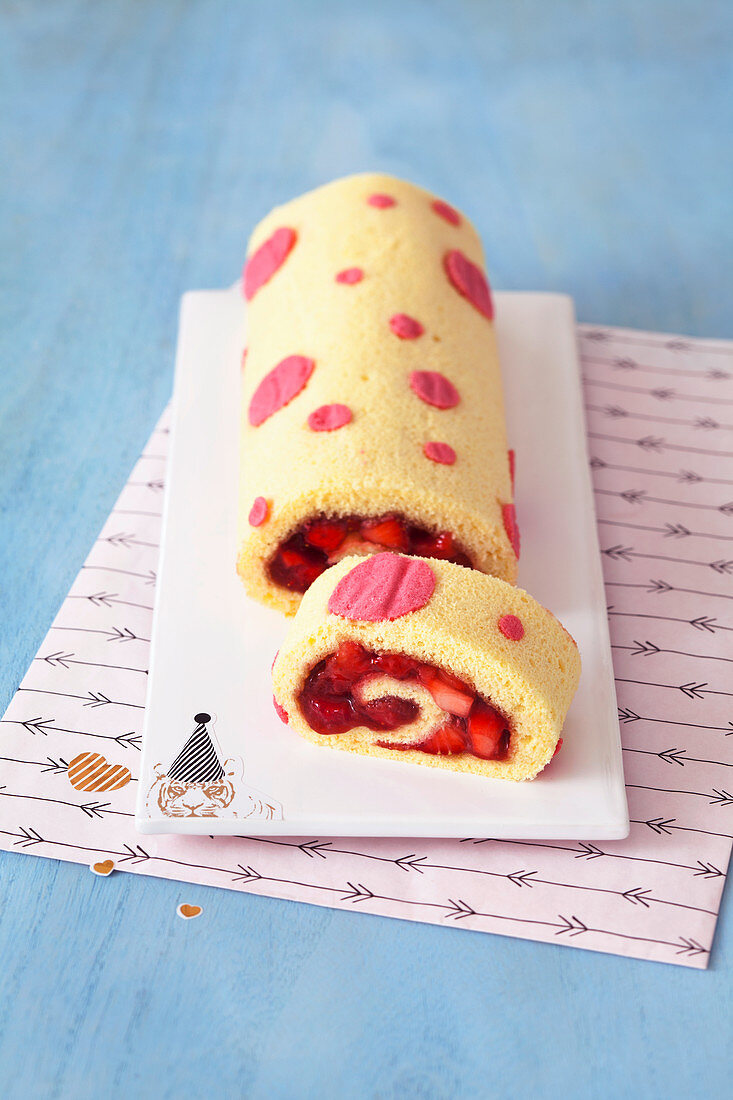 Polka dot sponge roll with strawberry filling