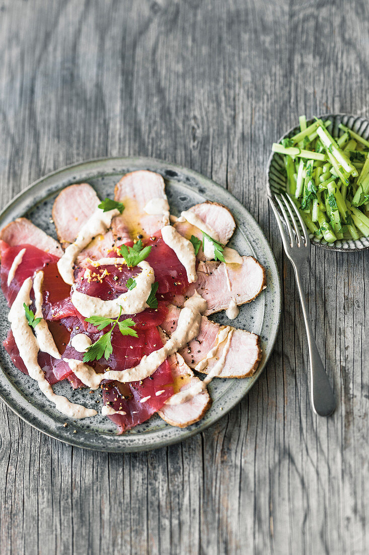 Vitello tonnato with parsley and cucumber salad