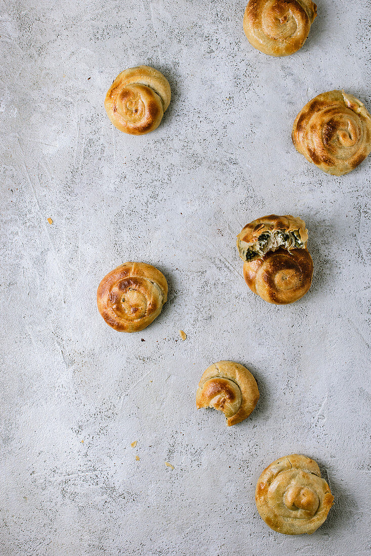 Greek handpies made of phyllo pastry, filled with feta and spinach