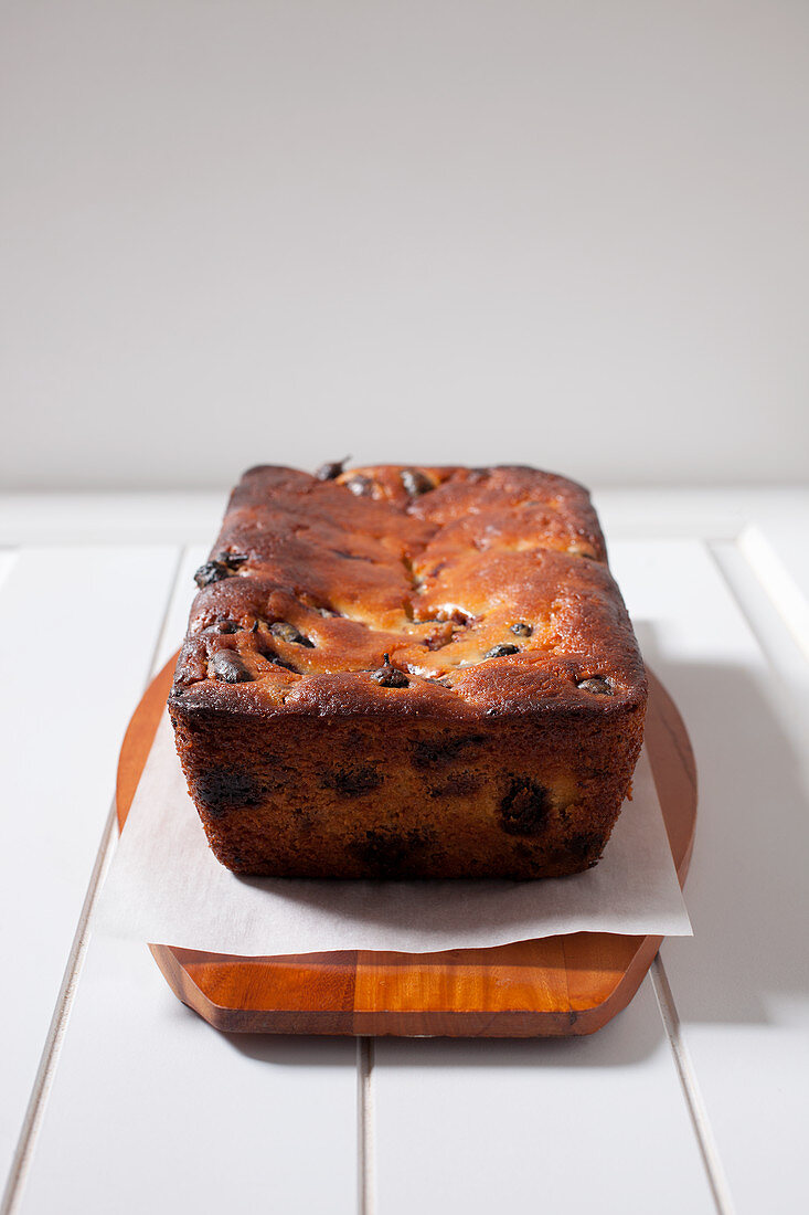 Freshly baked mulberry bread on cutting board