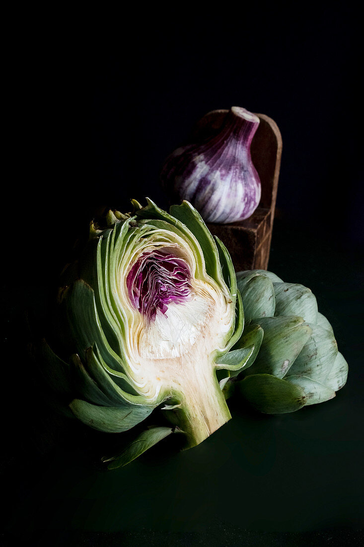 Portrait of the artichoke’s inside and a garlic