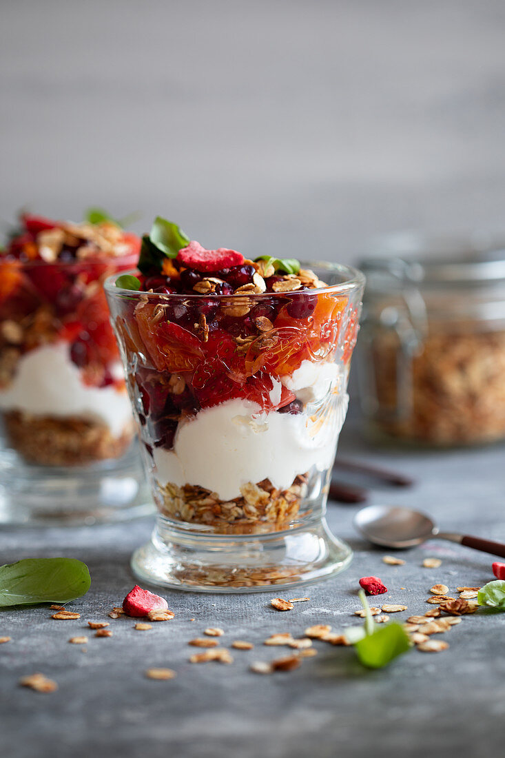 Blood orange parfait and oats in glasses