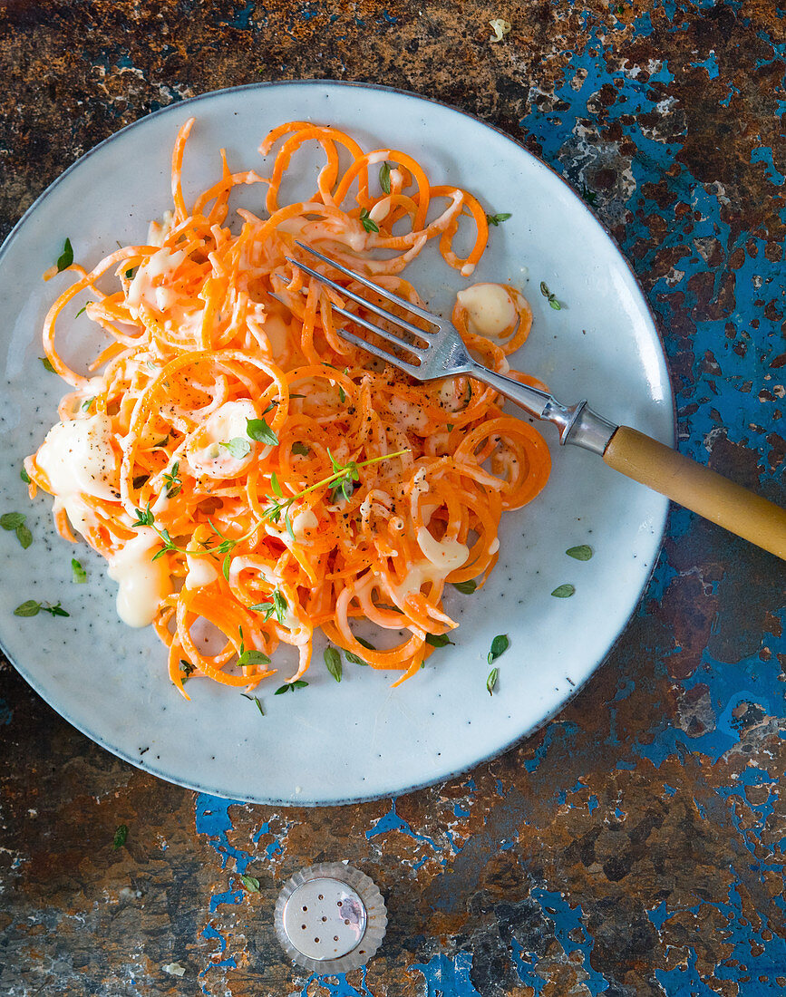 Carrot pasta with herb cream