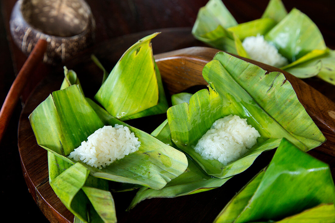 Sticky rice on banana leaf is a traditional thai street food sweet snack