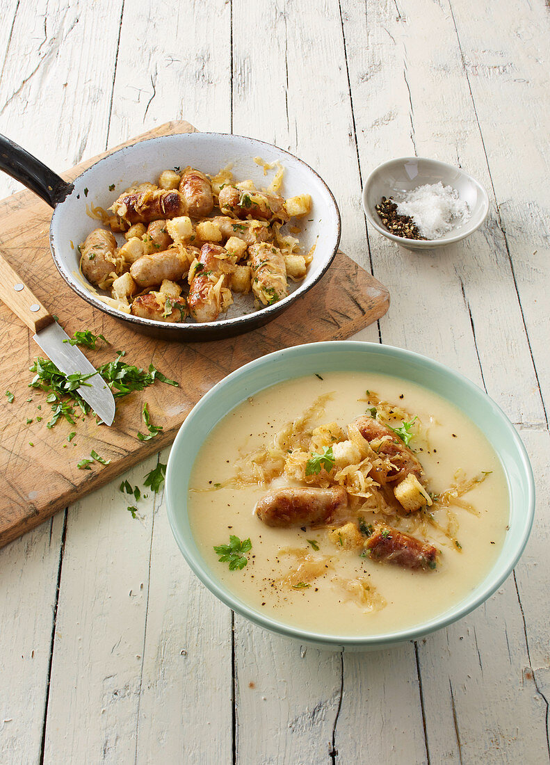 Potato and celery soup with Nuremberg sausages